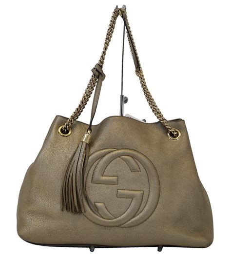 gold gucci bags|gucci bag gold chain.